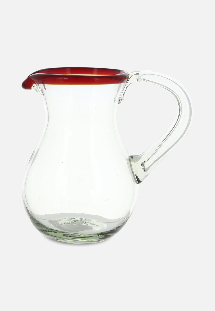 glass carafe with red rim from the side